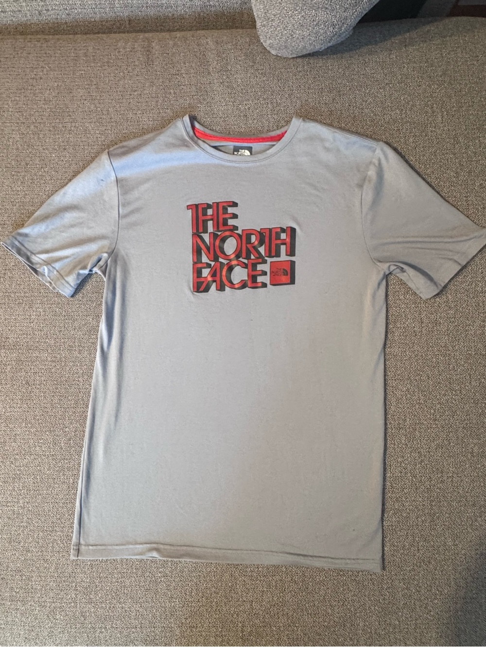 The North Face Boy’s Short Sleeve Crew Tee in Light Gray with Red Logo